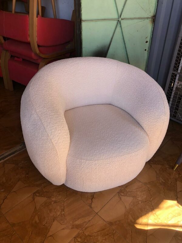 Fauteuil bouclette blanc.